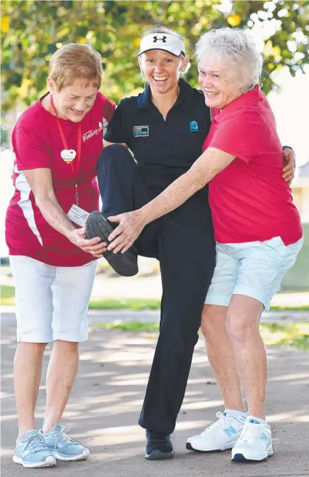  ?? LEG UP: Golden Shoe Award winner Andrea White ( centre) with volunteers Gail Brodie ( right) and Cecily Messer. ??