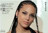  ??  ?? ALICIA KEYS WITH HER SIGNATURE BEADED PLAITS.