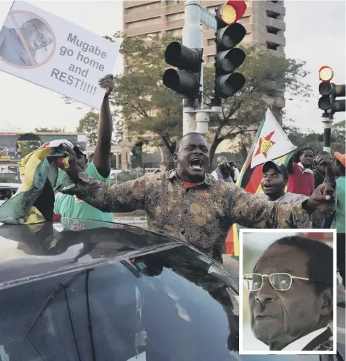  ?? PICTURE: MARCO LONGARI/GETTY IMAGES ?? 0 Crowds in Harare celebrate as the news that Robert Mugabe, inset, had resigned spread