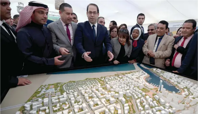  ??  ?? TUNIS: Tunisian prime minister Youssef Chahed (center) attends an event to kick off an investment project ahead of the internatio­nal conference on investment, Tunis 2020, in Raoued in the district of Ariana, yesterday. Tunisia will host 2,000 business...