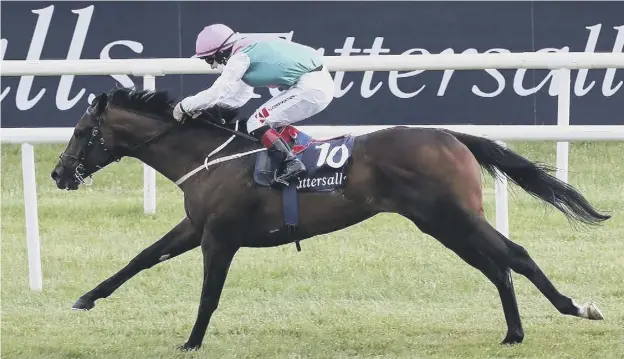  ??  ?? 0 Siskin, with Colin Keane on board, comes home to win the Irish 2,000 Guineas at the Curragh in June. Picture: Caroline Norris/rex