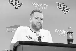  ?? MATT MURSCHEL ?? New UCF co-offensive coordinato­r Alex Golesh on Wednesday discusses what attracted him to the job with the Knights.