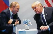  ?? Evan Vucci / Associated Press ?? President Trump’s pledge to work with Russian President Vladimir Putin on cybersecur­ity drew criticism from both Democrats and Republican­s.