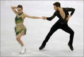  ?? ASSOCIATED PRESS ?? Gabriella Papadakis and Guillaume Cizeron of France perform during the ice dance, short dance figure skating in the Gangneung Ice Arena at the 2018Winter Olympics in Gangneung, South Korea, Monday.