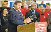  ?? Chris O’Meara Associated Press ?? GOV. RON DeSANTIS of Florida, which last week passed legislatio­n to curb federal vaccine mandates.