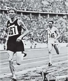  ??  ?? ‘‘He wins, he’s won, hooray!’’ Jack Lovelock breaks the tape to win the 1500m at the Berlin Olympics in 1936.