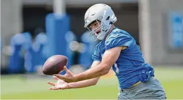  ?? Paul Sancya/Associated Press ?? Detroit Lions tight end Sam LaPorta catches a pass during practice on June 8 in Allen Park, Michigan. LaPorta was one of nine tight ends selected in the first three rounds of this year’s draft, the highest total since the common draft era began in 1967.