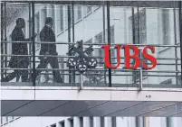  ?? STEFAN WERMUTH BLOOMBERG FILE PHOTO ?? UBS Group in Switzerlan­d said last month that customers whose deposits exceed 2 million Swiss francs ($2.7 million) will need to pay an interest fee of 0.75 per cent after November.