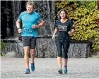  ?? SIMON O’CONNOR/STUFF ?? Triathlon coach Mark Turner trains in Pukekura Park with Cape Egmont Half Marathon organiser Nicky Smith. Turner will be providing a weekly programme event entrants can follow in the 16 weeks leading into the event, which is raising money for the Taranaki Cancer Society.