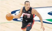  ?? JEFFREY MCWHORTER/ AP ?? COVID- 19 protocols have temporaril­y removed Avery Bradley from the Heat equation.