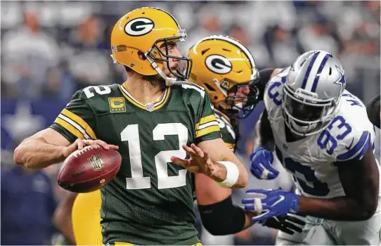  ?? Richard Rodriguez / Fort Worth Star-Telegram ?? Green Bay’s Aaron Rodgers has elevated his game to another level during his team’s current eight-game winning streak.