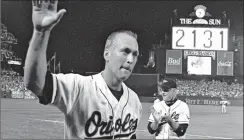  ?? DENIS PAQUIN/AP ?? Cal Ripken Jr. waves to the crowd, playing in his 2,131st straight game on Sept. 6, 1995.