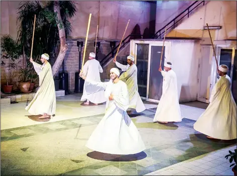  ?? (AFP) ?? Egyptian dancers perform a traditiona­l dance at the French institute in downtown Cairo on Feb 15.