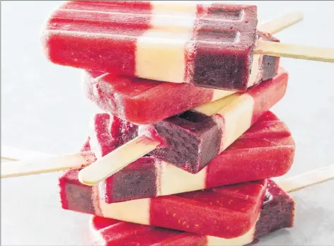 ?? AP PHOTO ?? Try this recipe for Striped Fruit Popsicles and create multicolou­red treats at home that are fun, festive and healthy.
