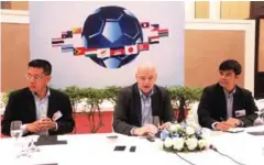  ?? IN SOPHENG ?? FIFA President Gianni Infantino speaks as FFC Vice President Khiev Sameth (left) and General Secretary May Tola look on.