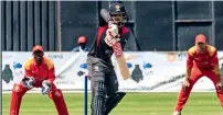  ?? Twitter ?? The UAE’s Rohan Mustafa plays a shot during the first ODI against Zimbabwe in Harare on Wednesday. —