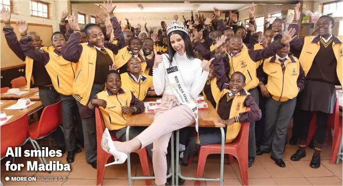  ?? Picture: Refilwe Modise ?? Miss South Africa Tamaryn Green with pupils from the Tshilidzi Primary School in Chiawelo, Soweto, where she spent her 67 minutes for Mandela yesterday, speaking to the children and painting classrooms.