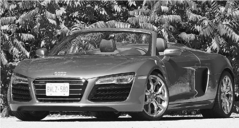  ?? David
Booth
/ Driving ?? The 2015 Audi R8 Spyder has all the bona fides of a supercar and is gorgeous to boot, but it won’t keep you running to the mechanic and you could even drive it all winter if you wanted.