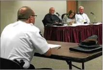  ??  ?? From left, Troy police Chief John Tedesco addresses members of the City Council’s Public Safety Committee during a Monday night meeting while council members Jim Gulli, Erin Sullivan-Teta and Dean Bodnar listen and take notes.