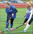  ?? KYLE MENNIG – ONEIDA DAILY DISPATCH ?? Camden’s Delainey Hebble (4) moves the ball up the field around Whitesboro’s Madeline Krecidlo (5) during their Section III Class B final in Manlius on Sunday.