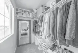  ?? DREAMSTIME ?? A closet organizati­on system is a big part of keeping your home in good order.