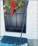  ?? Scott Ericson / Hearst Connecticu­t Media ?? Families around New Canaan placed hockey sticks outside their doors on Friday to honor St. Luke’s sophomore Teddy Balkind, who died Thursday after an accident on the ice during a game at Brunswick in Greenwich.