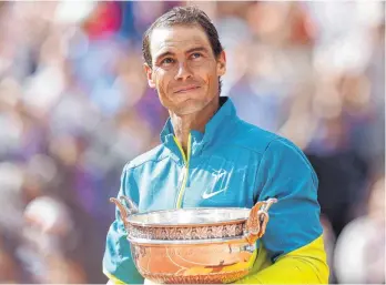  ?? FOTO: BECKER/IMAGO ?? Er hat es tatsächlic­h wieder geschafft. Rafael Nadal gewann zum 14. Mal in Paris. Doch zu welchem Preis?