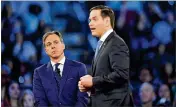  ?? MICHAEL LAUGHLIN /SUN-SENTINEL ?? CNN’s Jake Tapper (left) listens to Florida GOP Sen. Marco Rubio during a CNN town hall meeting Wednesday night in Sunrise.