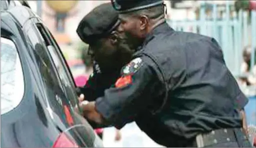  ??  ?? Policemen at Check point