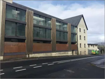  ?? Pic: ?? The unsightly ghost apartment block is one of several derelict properties the new Ballisodar­e Community Council plans to address next year. Sorcha Crowley.