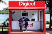  ??  ?? A Digicel store in Savusavu. COVID-19 travel restrictio­ns across the region have made it difficult for suitors to carry out site visits..