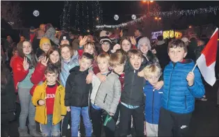  ?? (Pic: John Ahern) ?? YOUNG THINGS: Young people were out in force to celebrate the recent turning on of the Christmas lights in Mitchelsto­wn - no doubt the festive atmosphere in the town will draw many shoppers over Christmas.