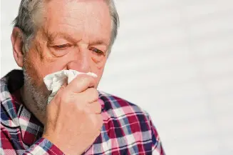  ?? Richard A. Marini/Getty Images ?? Sneezing is considered a protective reflex to keep irritants out of your nose.