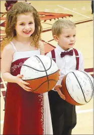  ?? Westside Eagle Observer/RANDY MOLL ?? Kindergart­en mascots at special coronation ceremonies at Gentry High School on Friday night were Sakari Hansen and Cooper Hillis.