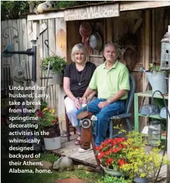  ??  ?? Linda and her husband, Larry, take a break from their springtime decorating activities in the whimsicall­y designed backyard of their Athens, Alabama, home.