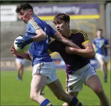  ??  ?? Brian Deeny tackling Wicklow’s Pádraig O’Toole during his days as a Wexford Minor footballer in 2017.