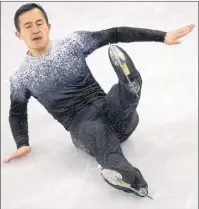  ?? THE CANADIAN PRESS/AP-BERNAT ARMANGUE ?? Patrick Chan of Canada falls while performing in the men’s short program figure skating in the Gangneung Ice Arena at the 2018 Winter Olympics in Gangneung, South Korea, Friday. Chan could feel the troublesom­e jump get away from him before his blades...