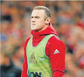  ?? /AFP ?? Missing home? Wayne Rooney has spent most of the season on the bench at Manchester United, but would get a lot more game time at his former club Everton.