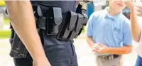  ?? RICARDO RAMIREZ BUXEDA/ORLANDO SENTINEL ?? Load-bearing vests are being tested in Orange County as a possible replacemen­t for the duty belts.