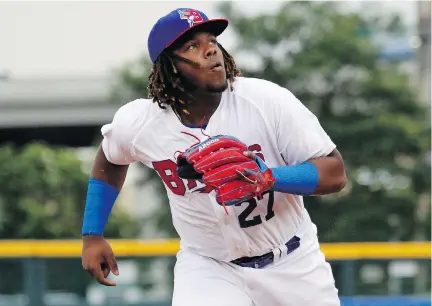  ?? JEFFREY T. BARNES/THE ASSOCIATED PRESS ?? The Buffalo Bisons’ Vladimir Guerrero Jr. chases a foul ball during the first inning of his Triple-A debut with the Toronto Blue Jays affiliate on Tuesday in Buffalo N.Y. Guerrero walked three times in his first three plate appearance­s, scored two...