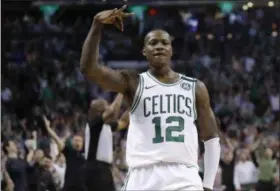  ?? CHARLES KRUPA — THE ASSOCIATED PRESS ?? Celtics guard Terry Rozier gestures after sinking a 3-point shot during the second half in Game 2 of the team’s Eastern Conference finals against the Cavaliers on May 15.