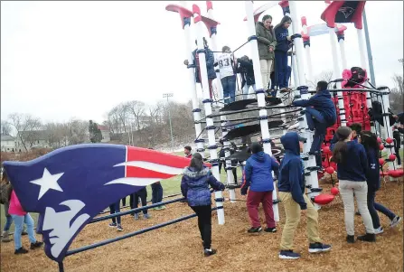  ?? Ernest A. Brown photos ?? ABOVE: Central Falls youngsters try out the new Patriots Playground.