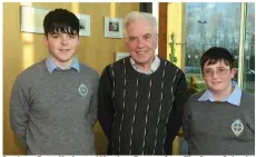  ?? Students Peter Kerins and Matthew Browne from The Green School, Tralee, with Fr McVerry. ??