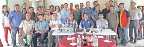  ??  ?? Dr Jerip (seated second right) and officers from Public Works Department, KWB and Rural Water Supply Department as well as some residents of BRS.