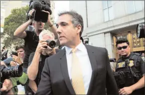  ?? BRYAN SMITH/ZUMA PRESS ?? President Donald Trump’s longtime personal lawyer, Michael Cohen, leaves New York Federal Court after making a plea deal on Tuesday. Cohen pleaded guilty to eight criminal counts, including tax fraud, false statements to a bank and campaign finance violations.