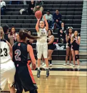  ?? TIM GODBEE / For the Calhoun Times ?? Calhoun’s Cassie Henderson (11) takes a jump shot during the first half on Saturday.