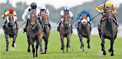  ??  ?? Close finish: Luke Morris helps Marsha (second left) chase down Frankie Dettori on Lady Aurelia (right) at York yesterday