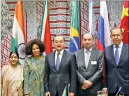  ?? IANS ?? [ L- R] External Affairs Minister Sushma Swaraj with her counterpar­ts from South Africa, Lindiwe Sisulu; China, Wang Yi; Brazil, Aloysio Nunes; and Russia, Sergey Lavrov, before their meeting at the UN headquarte­rs in New York, US, on Thursday.