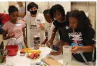  ?? (Special to The Commercial/Arts & Science Center for Southeast Arkansas) ?? The Arts & Science Center for Southeast Arkansas will host its free community service project, Kids Cookin’ for a Cause, Dec. 10.