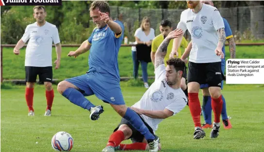  ??  ?? Flying West Calder (blue) were rampant at Station Park against rivals Livingston